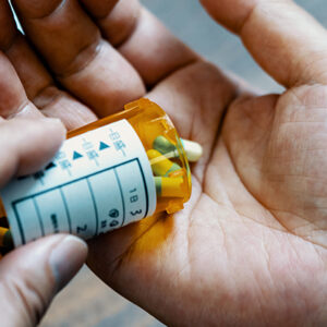 Hands Bottle Pills Dementia.jpg